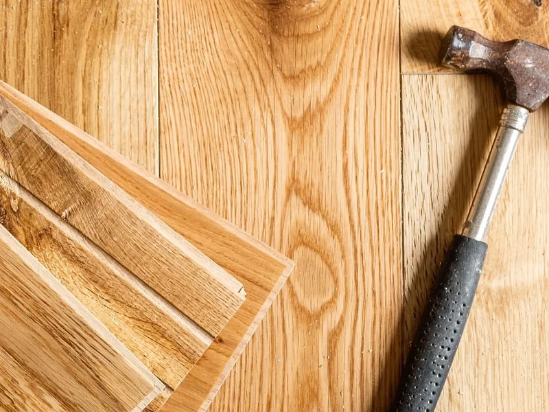 Hammer on Hardwood Plank Flooring